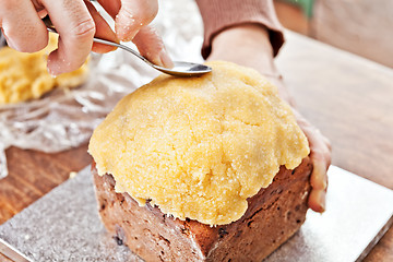 Image showing Modeling christmas cake with spoon