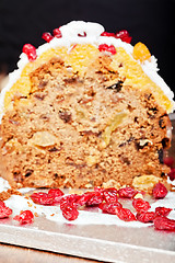 Image showing Red candieds and christmas cake