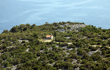 Image showing Mediterranean style chapel made of stone by the sea, Croatia