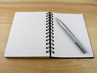 Image showing Notebook & pen