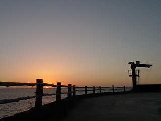 Image showing sunset on a dock