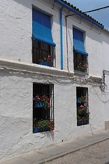 Image showing Plastered wall of two-storied Mediterranean house with four windows