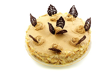 Image showing Coffee cake with chocolate decoration.