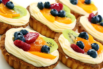 Image showing Cream cakes and fruit.