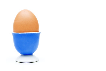 Image showing Boiled egg in an eggcup