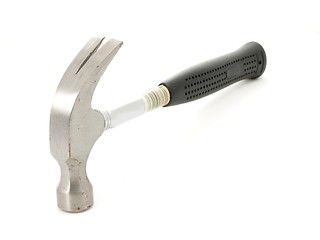 Image showing Steel hammer towards white