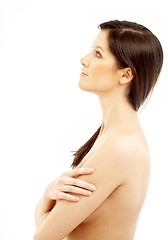 Image showing topless brunette looking up