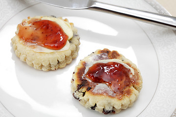 Image showing Welsh cakes with strawberry jam