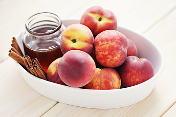 Image showing peaches with honey and cinnamon