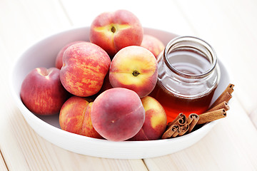 Image showing peaches with honey and cinnamon