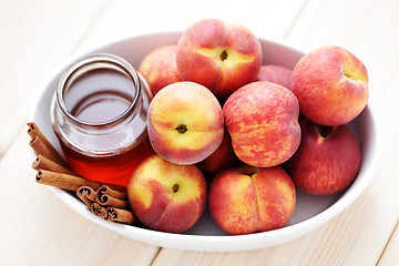 Image showing peaches with honey and cinnamon