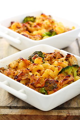 Image showing Baked pasta with cheese in a porcelain bowl.