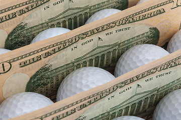 Image showing Money and golf balls