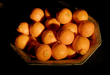 Image showing A Pile of Tasty Tangerines on a Mexican Platter