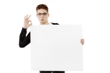 Image showing Young man with a blank baner