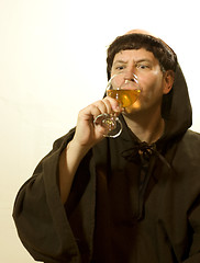 Image showing The Monk Drinks Deeply from the Glass