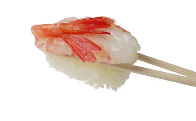 Image showing Shrimp sushi in chopsticks