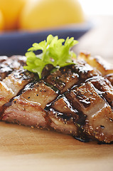 Image showing Duck meat on wood