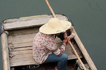 Image showing Chinese girl on a boat