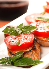 Image showing Bruschetta with tomato and basil