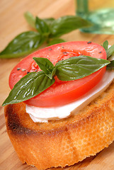 Image showing Bruschetta with tomato, mozzarella and basil