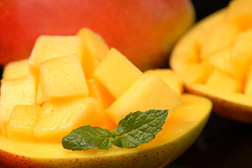 Image showing Sweet mango diced up and served in its shell