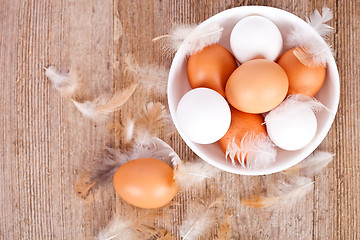 Image showing brown and white eggs in a bowl