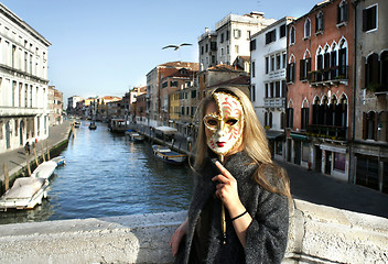 Image showing Woman in beautiful Venetian mask in Venice