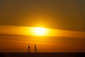 Image showing Roller skating at  sunset