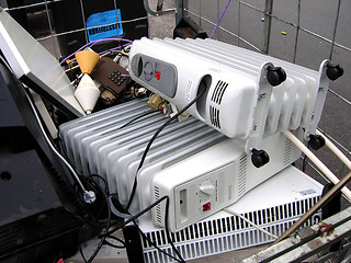 Image showing Broken oil heater