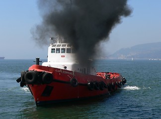 Image showing Smoking Tug