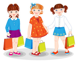 Image showing Little girls with bags. Shopping.