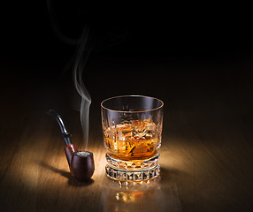 Image showing Pipe and whiskey