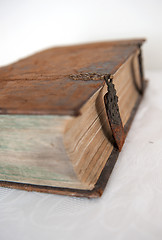 Image showing Aged, very old book on focus and blur