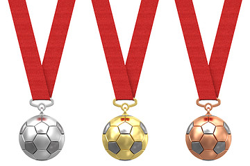 Image showing Gold, silver and bronze soccer ball with red ribbons