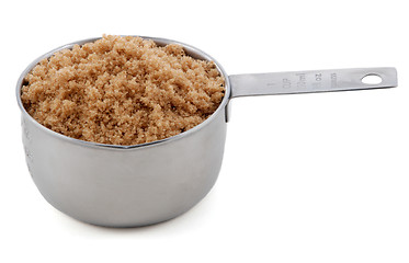 Image showing Light brown soft / muscovado sugar presented in a cup measure