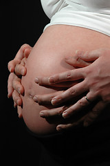 Image showing Pregnant woman and hands