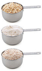 Image showing Everyday staple ingredients - rolled oats and flours - in cups