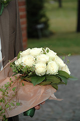 Image showing Groom and bouquet