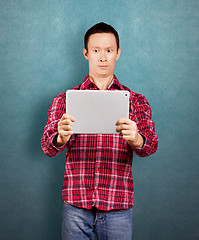 Image showing Asian Man With Touch Pad