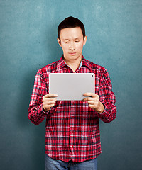 Image showing Asian Man With Touch Pad