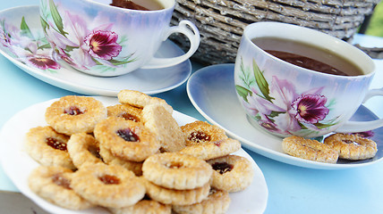 Image showing Tea time with cookies 