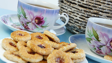 Image showing Tea time with cookies 