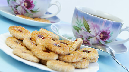Image showing Tea time with cookies 