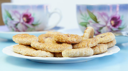 Image showing Tea time with cookies 