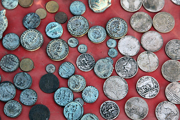 Image showing Collection of old coins from different countries, El-Jem market, Tunisia
