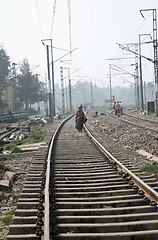 Image showing A woman walking on the railroad, Baruipur West Bengal