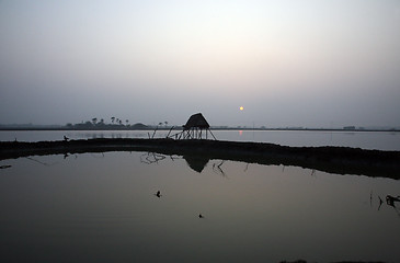 Image showing A stunning sunrise looking over the holiest of rivers in India. Ganges delta in Sundarband, West Bengal, India.