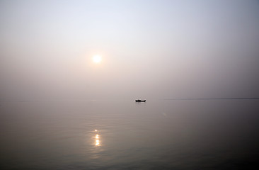 Image showing A stunning sunset looking over the holiest of rivers in India. Ganges delta in Sunderbands, West Bengal, India