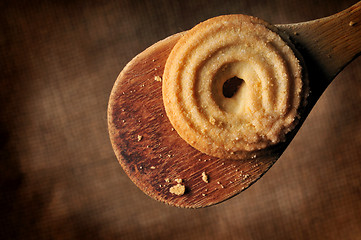 Image showing Cookie on wooden spoon ambient light